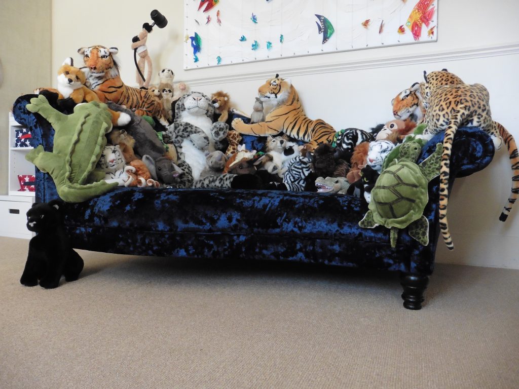 Bespoke design & build upholstered sofa with sewn in soft toys Hill Upholstery & Design Essex and London