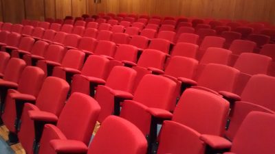 theatre seat reupholstery for Natural History Museum upholstered using fabric from Camira Hill Upholstery & Design Essex and London
