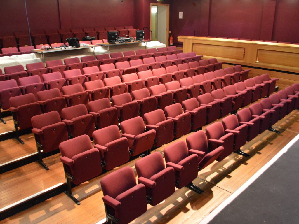 Theatre seat upholstery auditorium upholstery recover Hampton Hill theatre - Hill Upholstery & Design