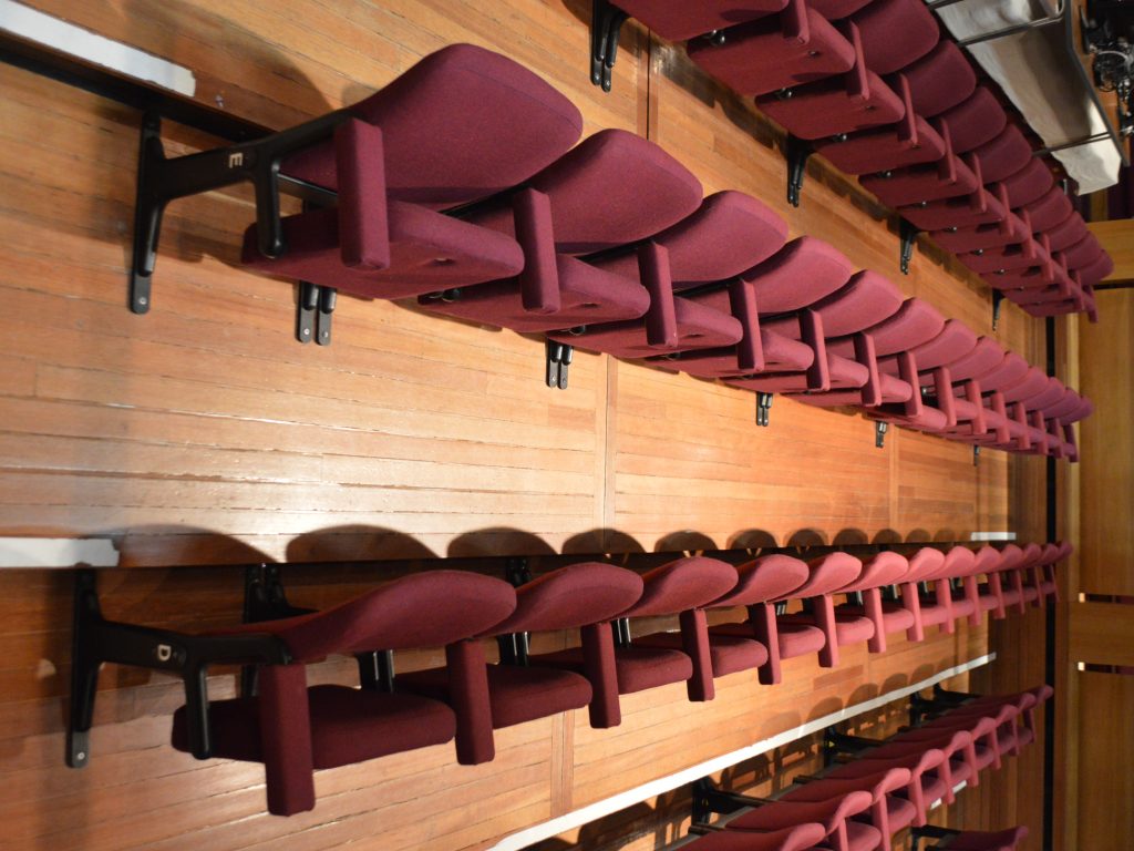 Theatre seat upholstery auditorium upholstery recover Hampton Hill theatre - Hill Upholstery & Design