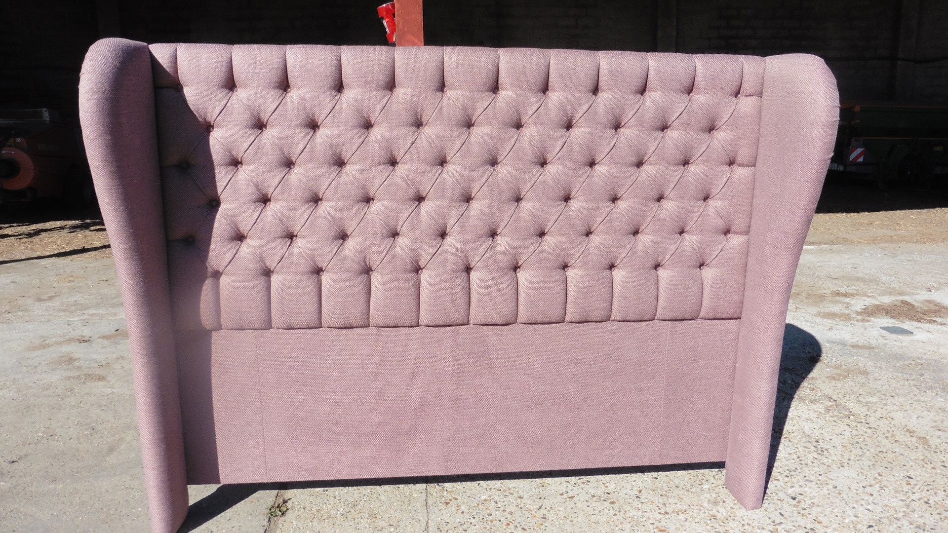 Deep buttoned headboard